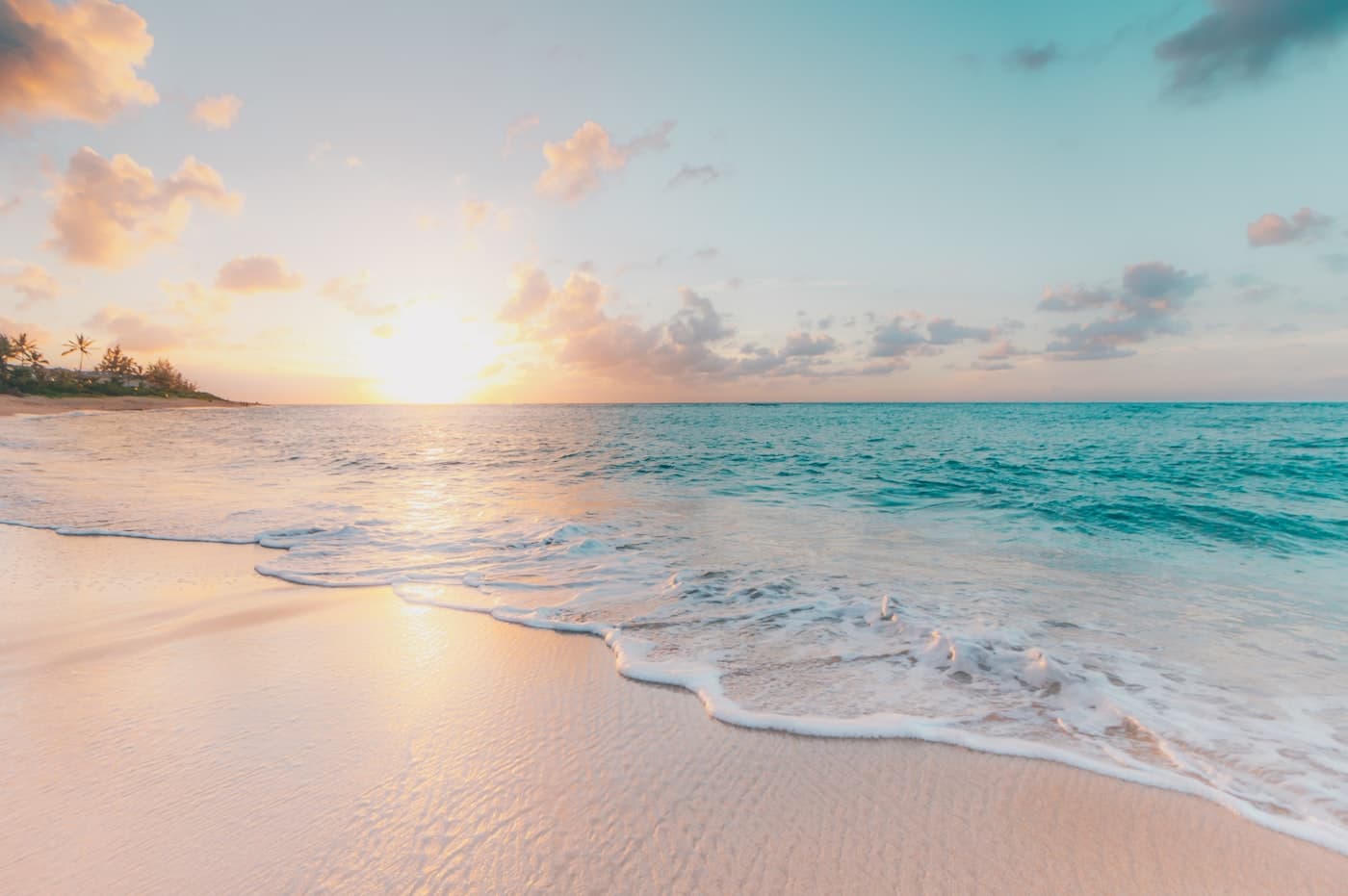 Turquoise sea breaking on a tropical beach
