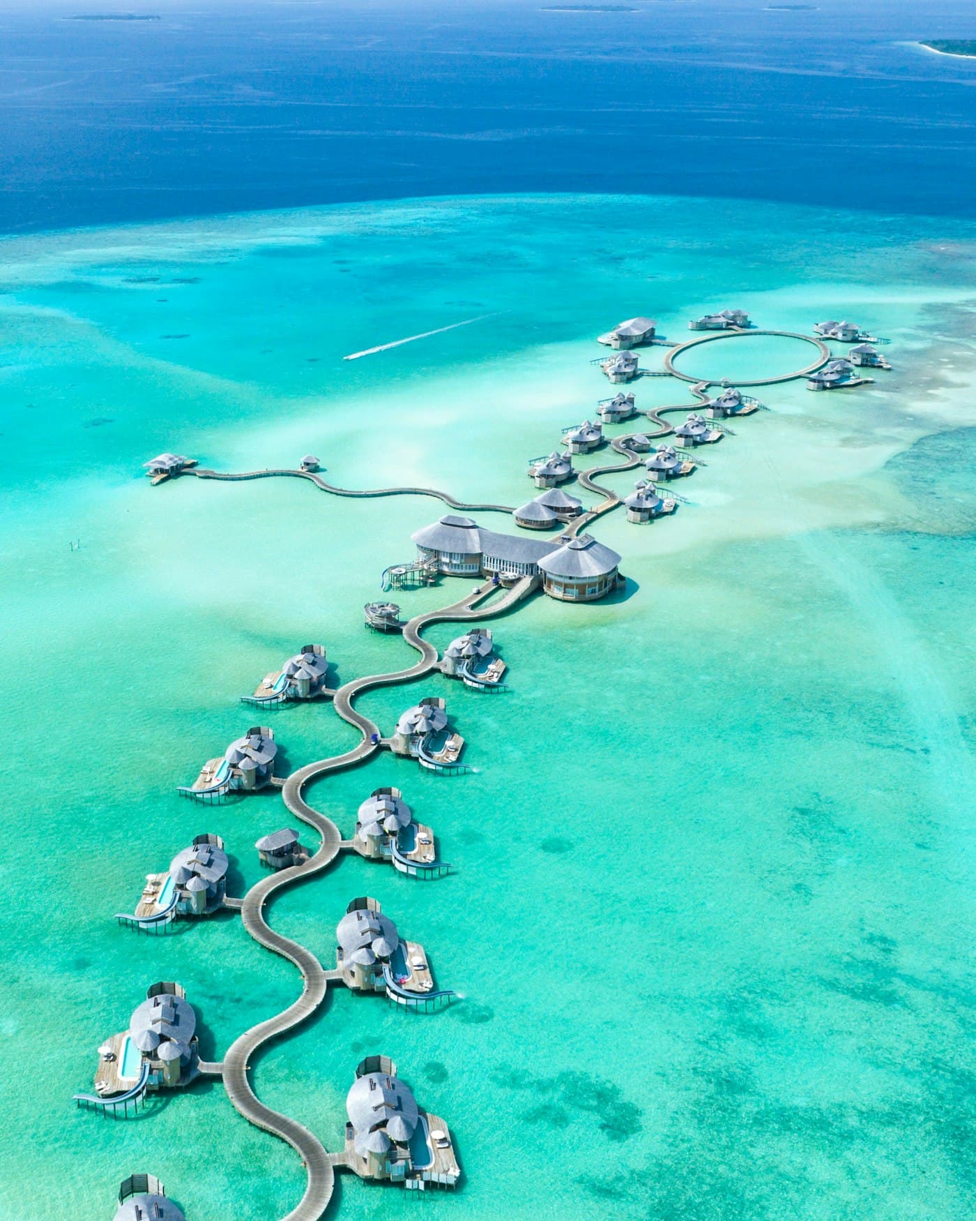Turquoise lagoon with over-water villas in the Maldives